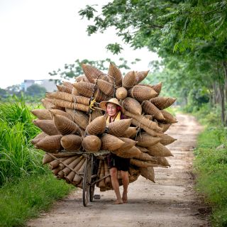 Vietnamese auf dem Weg zum Markt